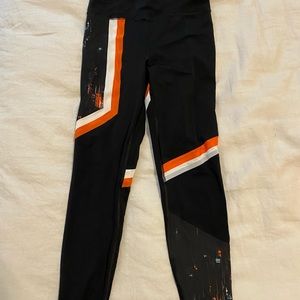 leggings with orange detail